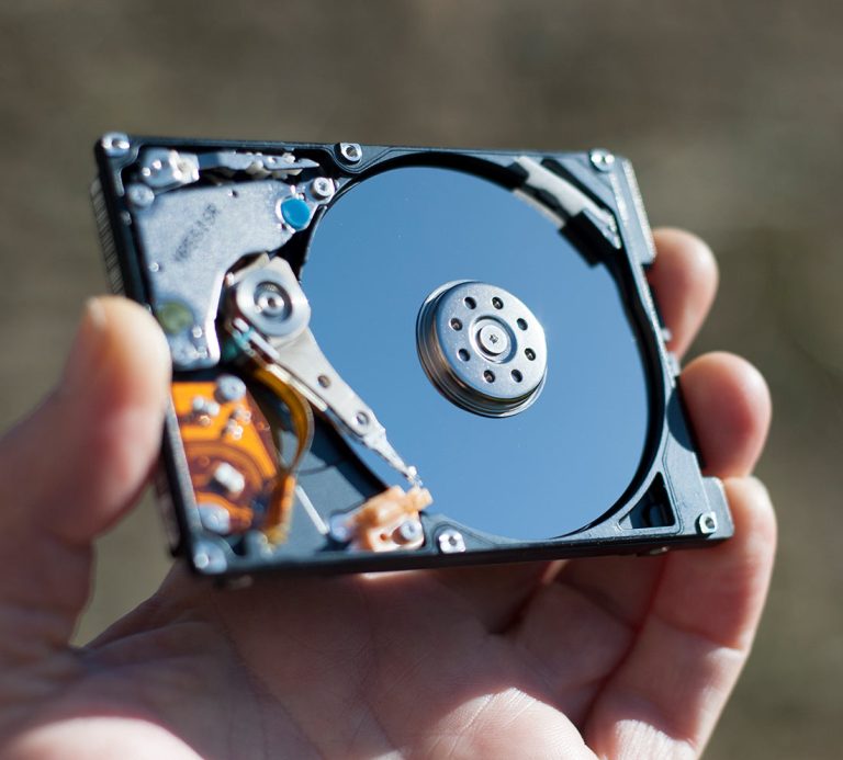 Hard drive being held